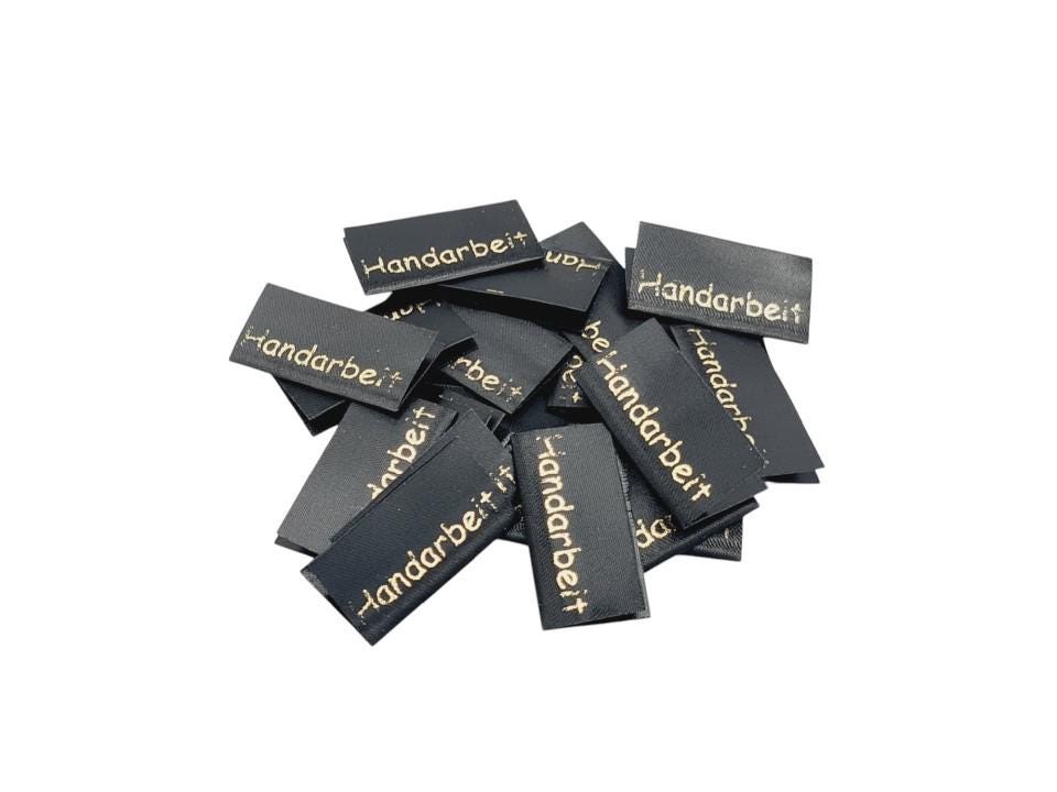 20 St. Textiletiketten Handarbeit -  schwarz/gold